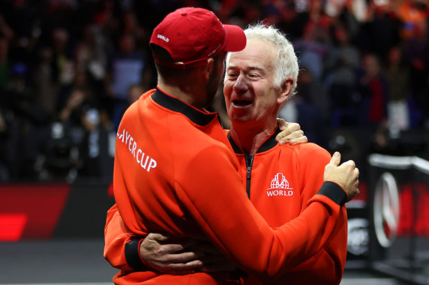 John McEnroe celebrates with Jack Sock after winning the Laver Cup.