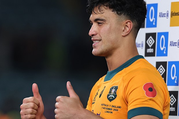 Joseph-Aukuso Suaalii of Australia celebrates after their victory.