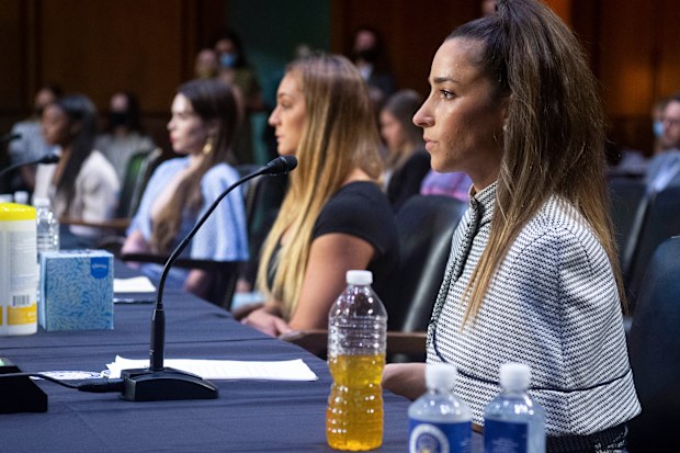 US Olympic gymnasts Simone Biles, McKayla Maroney,  Maggie Nichols, and Aly Raisman, testify during a Senate Judiciary hearing about the Inspector General's report on the FBI handling of the Larry Nassar investigation of sexual abuse of Olympic gymnasts, on Capitol Hill, September 15, 2021, in Washington, DC.