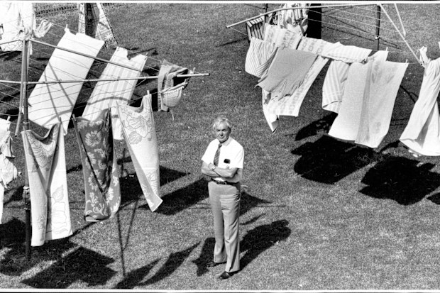 Gerald Wright, Regional Director of the New South Wales Branch of Hills with a Backyard of Hills Hoists. February 13, 1989.