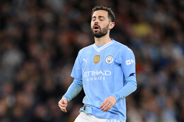 Bernardo Silva of Manchester City reacts after missing his penalty.