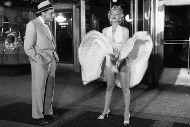 Tom Ewell and Marilyn Monroe in a scene from the movie The Seven Year Itch.