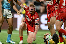 Tom Flegler celebrates a try.
