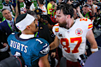 Jalen Hurts #1 of the Philadelphia Eagles and Travis Kelce #87 of the Kansas City Chiefs meet after Philadelphia beat Kansas City 40-22 to win Super Bowl LIX at Caesars Superdome on February 09, 2025 in New Orleans, Louisiana. (Photo by Gregory Shamus/Getty Images)