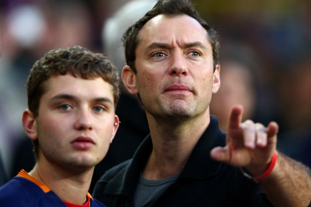 Jude Law and son Rafferty at a soccer match in Spain in 2016.