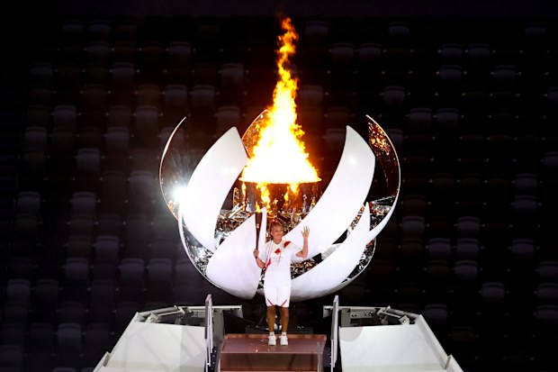Naomi Osaka just after lighting the Olympic flame at the opening ceremony.
