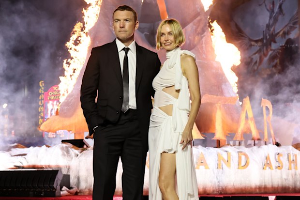 Sam Worthington and Lara Worthington attend the world premiere of 20th Century Studios "Avatar: Fire and Ash"