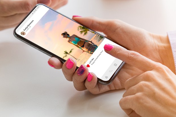 Woman looking at Instagram