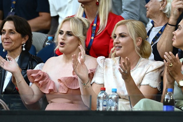 MELBOURNE, AUSTRALIA - JANUARY 12: Rebel Wilson and wife Ramona Agruma watch the Women's Singles First Round match between Aryna Sabalenka and Sloane Stephens of the United States during day one of the 2025 Australian Open at Melbourne Park on January 12, 2025 in Melbourne, Australia. (Photo by Quinn Rooney/Getty Images)