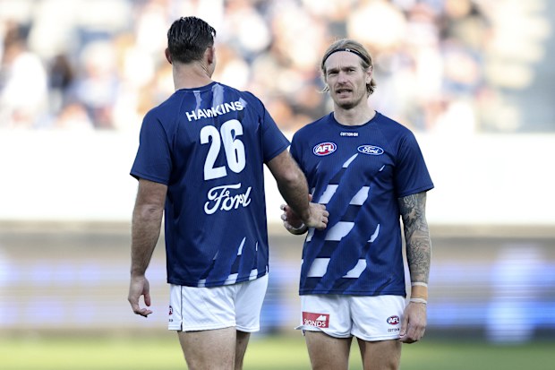 Tom Hawkins and Tom Stewart warm up in round 11, 2024.