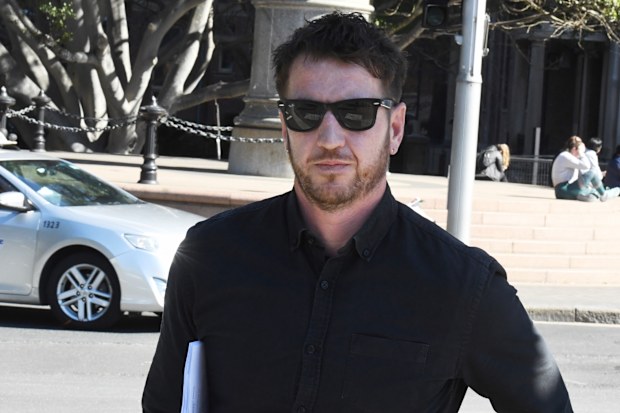 Axe attack victim, Ben Rimmer leaves the Supreme Court building in Sydney after Evie Amati's nine-year jail term increased to 14 years.