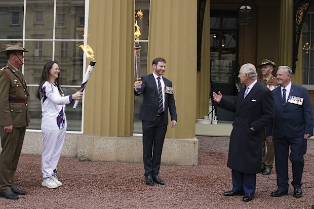 King Charles III, third right, attends the start of the Australian Legacy Torch Relay to mark the beginning of the London-leg of the charity's relay race in celebration of their centenary year at Buckingham Palace in London, Friday April 28, 2023.  