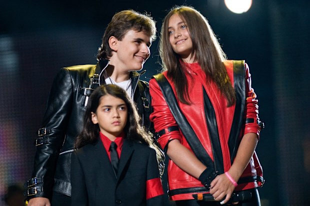 From left to right: Prince Michael Jackson, Bigi Jackson and Paris Jackson appear on stage at the Michael Forever Tribute Concert in memory of the late Michael Jackson at the Millennium Stadium in 2011 in Cardiff, Wales.