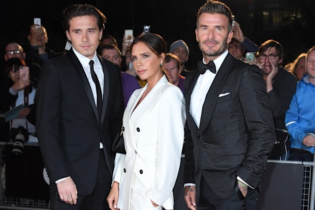 Brooklyn Beckham, Victoria Beckham and David Beckham 