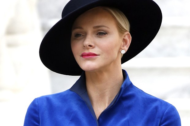 Princess Charlene, Prince Albert II of Monaco's wife, attends the celebrations marking Monaco's National Day in Monaco, Sunday, Nov. 19, 2017. Monaco's Fete Nationale has been celebrated since the reign of Prince Charles III in 1857. (Sebastien Nogier/Pool photo via AP)