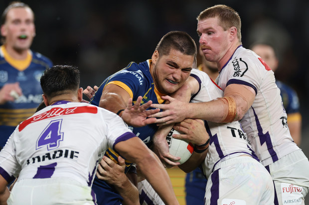 SYDNEY, AUSTRALIA - MARCH 02: Wiremu Greig of the Eels is tackled during the round one NRL match between the Parramatta Eels and the Melbourne Storm at CommBank Stadium on March 02, 2023 in Sydney, Australia. (Photo by Cameron Spencer/Getty Images)
