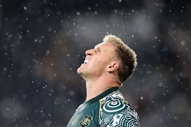 Reece Hodge of the Wallabies looks to the skies.