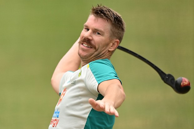 David Warner of Australia warms up in the nets.