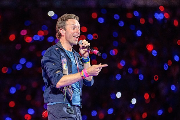 LONDON, ENGLAND - AUGUST 22: (EDITORIAL USE ONLY) Chris Martin of Coldplay performs onstage during a concert at Wembley Stadium on August 22, 2025 in London, England. (Photo by Jo Hale/Redferns)