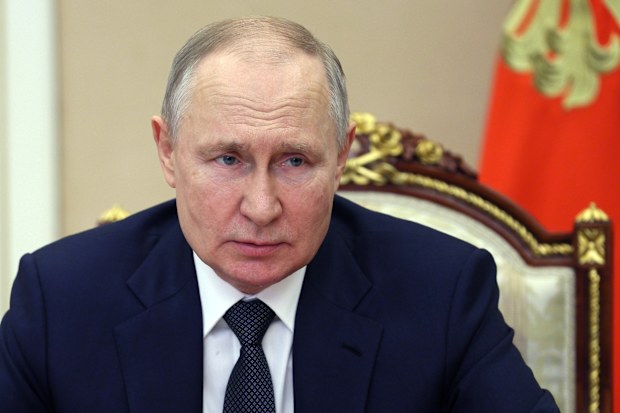 Russian President Vladimir Putin chairs a Security Council meeting in Moscow, Russia, Friday, March 24, 2023. 