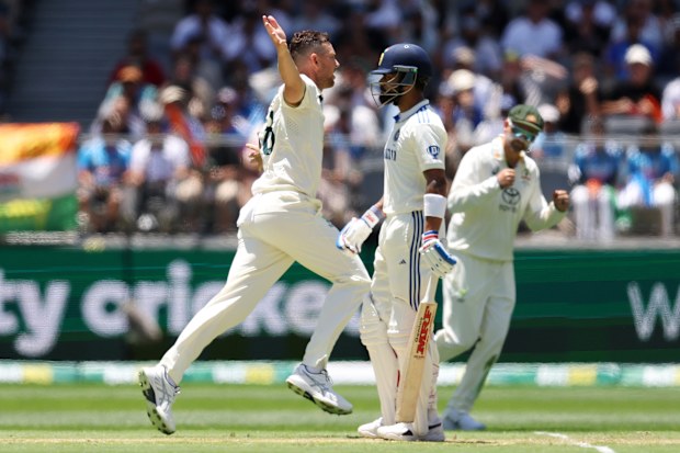 Josh Hazlewood of Australia celebrates taking the wicket of Virat Kohli of India.