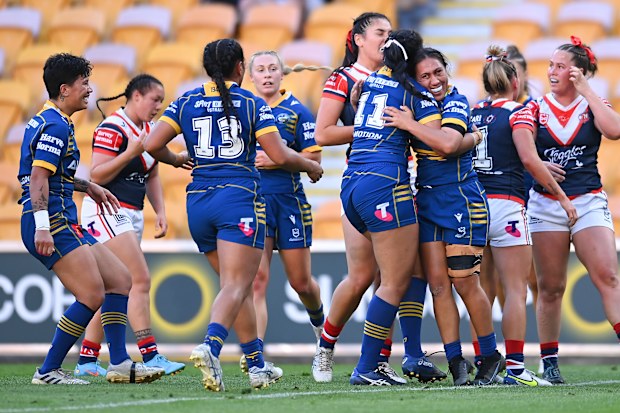 Ashleigh Quinlan of the Eels celebrates scoring a try against the Roosters.