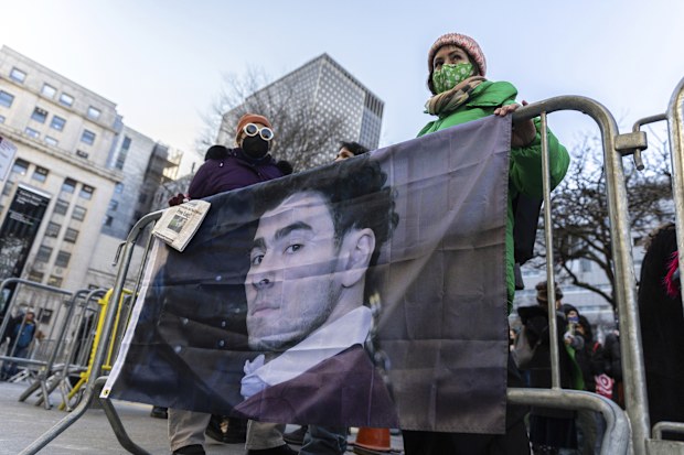 Luigi Mangione supporters stand outside the Supreme Court on Friday, Feb. 21, 2025 in New York. (AP Photo/Stefan Jeremiah)