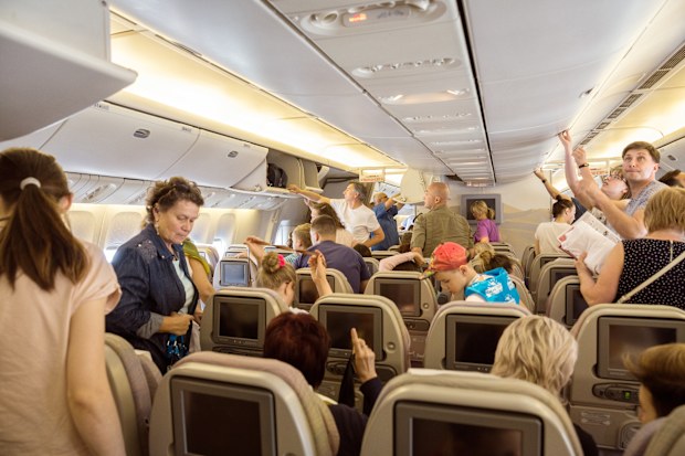 Burgas, Bulgaria - June 24, 2019: Passengers of the charter flight from St. Petersburg are preparing to leave the plane after landing
