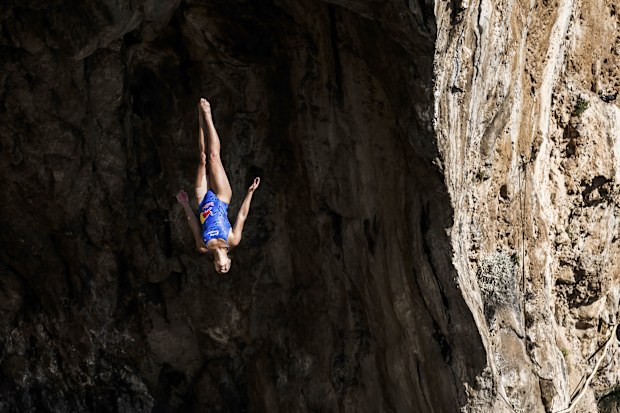 In this handout image provided by Red Bull, Rhiannan Iffland of Australia dives from the 21 metre platform during the second competition day of the first stop of the Red Bull Cliff Diving World Series on May 25 2024 at Athens, Greece.