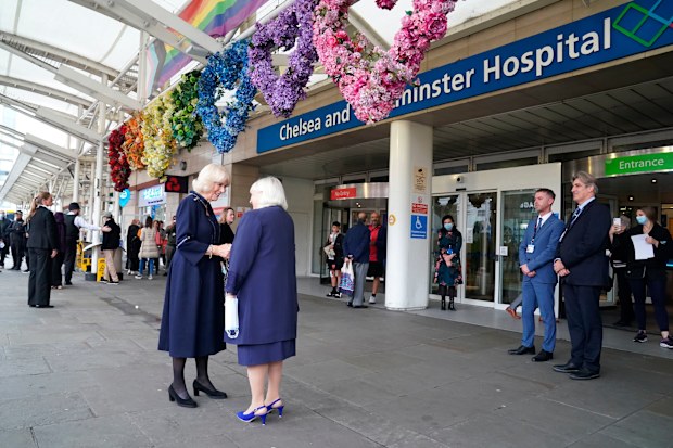 Camilla, the Queen Consort, is greeted by Colonel Jane Davis, Vice Lieutenant of Greater London as she arrives for a visit to a maternity unit at Chelsea and Westminster hospital in London Thursday, Oct. 13, 2022, to meet key domestic abuse frontline staff.