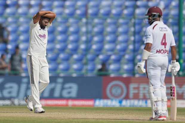 India's Mohammed Siraj reacts after beating West Indies' John Campbell.