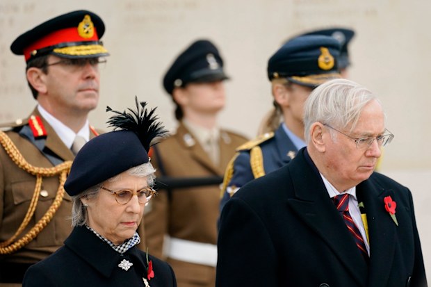 Britain's Prince Richard, Duke of Gloucester and his wife Birgitte, Duchess of Gloucester join members of the armed forces, veterans and the public during an Armistice Day service, marking the anniversary of the end of the First World War, at the Armed Forces Memorial in the National Memorial Arboretum, Alrewas, England,  Friday, Nov. 11, 2022. (Jacob King/PA via AP)