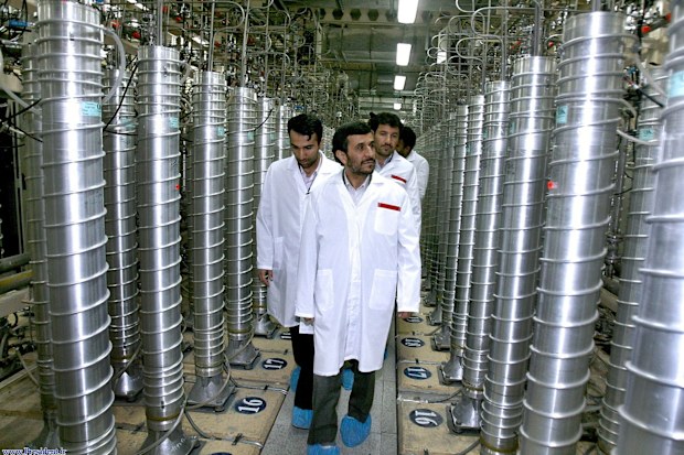 In this photo released by the Iranian President's Office, then-Iranian President Mahmoud Ahmadinejad, center, visits the Natanz Uranium Enrichment Facility near Natanz, Iran, April 8, 2008.