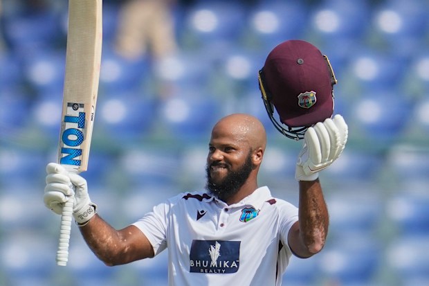 West Indies' John Campbell celebrates after scoring a century.