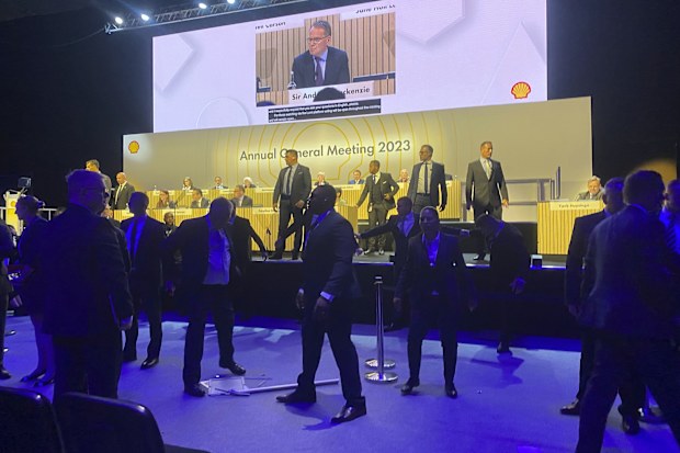 Security after protesters tried to storm the stage at the Excel centre in east London during oil giant Shell's annual general meeting in London, Tuesday, May 23, 2023. 