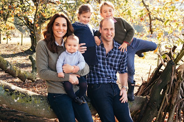 This photo released by Kensington Palace on Friday Dec. 14, 2018, shows the photo taken by Matt Porteous of Prince William and Kate, Duchess of Cambridge with their children Prince George, right, Princess Charlotte, center, and Prince Louis at Anmer Hall in Norfolk, east England, which is to be used as their 2018 Christmas card. (Matt Porteous/Kensington Palace via AP)