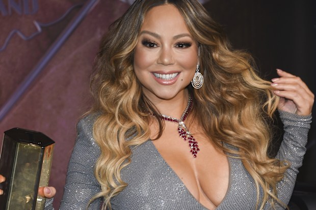 Singer Mariah Carey participates in the ceremonial lighting of the Empire State Building to commemorate the 25th anniversary of the release of her single "All I Want For Christmas Is You" on Tuesday, Dec. 17, 2019, in New York.