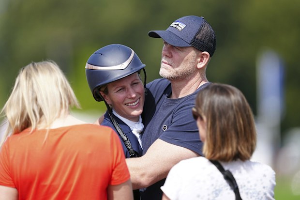 Zara Tindall hugs her husband Mike, on day two of the Badminton Horse Trials 2024 at the Badminton Estate in Badminton, England, Thursday, May 9, 2024