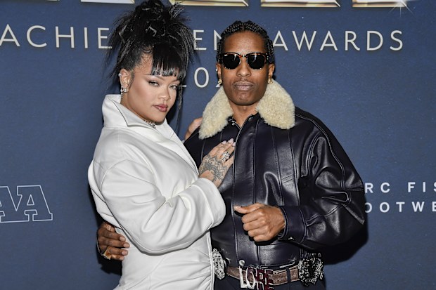 A$AP Rocky and Rihanna attend the 38th annual Footwear News Achievement Awards in 2024.