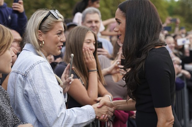 Meghan Markle Windsor walkabout hug