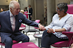 King Charles III meets patients during a visit to the University College Hospital Macmillan Cancer Centre in London, Tuesday April 30, 2024. 