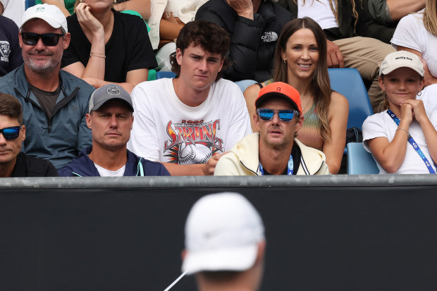 Lleyton Hewitt and Bec Hewitt watch their son Cruz Hewitt of Australia compete against Alexander Razeghi of the United States in their first round singles match during the 2024 Australian Open Junior Championships at Melbourne Park on January 21, 2024 in Melbourne, Australia. 