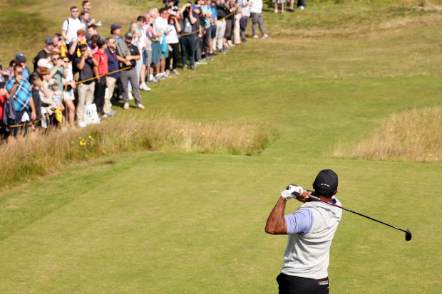 Tiger Woods of the United States tees off on the 10th hole prior to The 152nd Open championship at Royal Troon on July 15, 2024 in Troon, Scotland. (Photo by Kevin C. Cox/Getty Images)