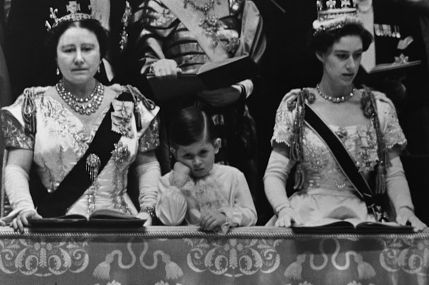 Prince Charles with his Aunt, Princess Margaret (r) and his Grandmother, Elizabeth the Queen Mother, at the 1953 Coronation of his mother, Queen Elizabeth II. (Photo by Hulton-Deutsch/Hulton-Deutsch Collection/Corbis via Getty Images)