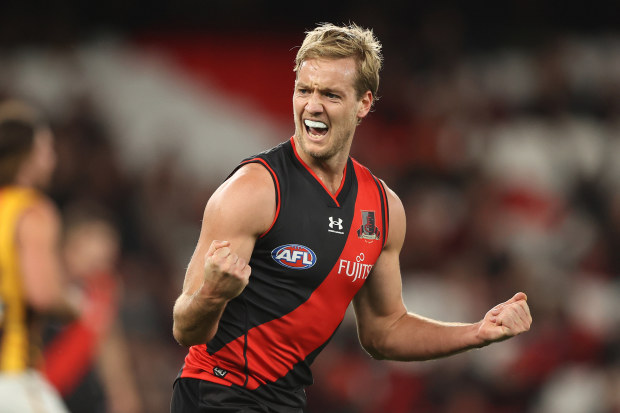 MELBOURNE, AUSTRALIA - MAY 07: Darcy Parish of the Bombers celebrates after scoring a goal during the round eight AFL match between the Essendon Bombers and the Hawthorn Hawks at Marvel Stadium on May 07, 2022 in Melbourne, Australia. (Photo by Robert Cianflone/Getty Images)