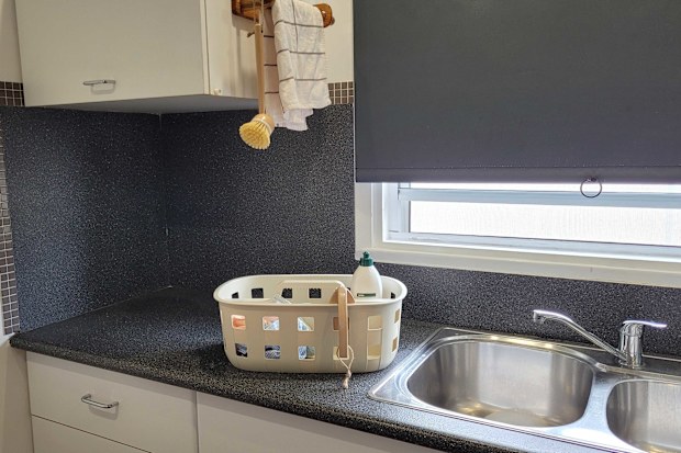 Kmart trellis cleaning caddy filled with cleaning supplies