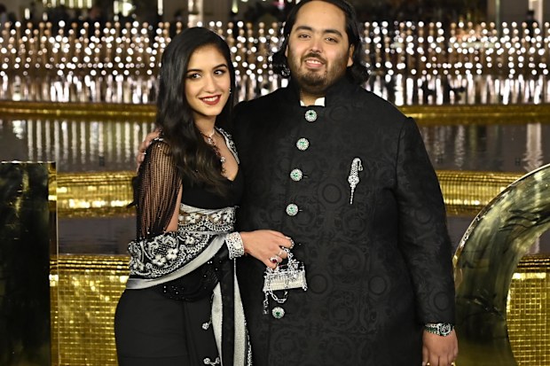 Anant Ambani with Radhika Merchant during the inauguration of the Nita Mukesh Ambani Cultural Centre on March 31, 2023 in Mumbai, India. Nita Ambani's dream project, which is housed within the Jio Global Centre in Bandra-Kurla Complex, aims to preserve and promote Indian arts. The event saw the presence of prominent celebrities and businessmen. 