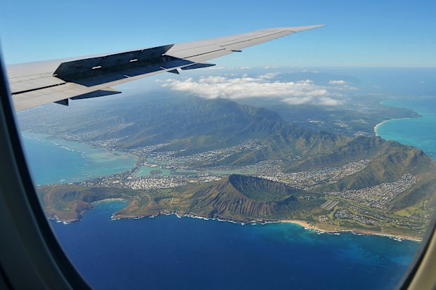 View from the plane towards iconic hawaiian volcano crater