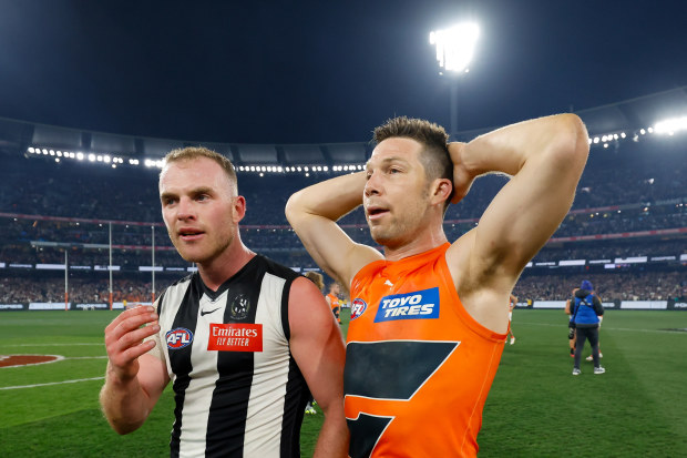 Tom Mitchell (left) and Toby Greene pictured during the preliminary final between the Magpies and Giants.