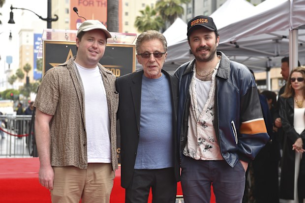Franki Valli, center, and his sons Brando Valli and Emilio Valli attend a ceremony honoring Frankie Valli and The Four Seasons with a star on the Hollywood Walk of Fame on Friday, May 3, 2024, in Los Angeles. (Photo by Jordan Strauss/Invision/AP)